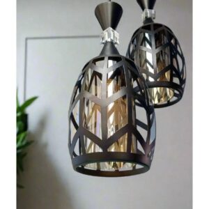 Stylish black pendant lights sleek metal frame with single bulb for modern space